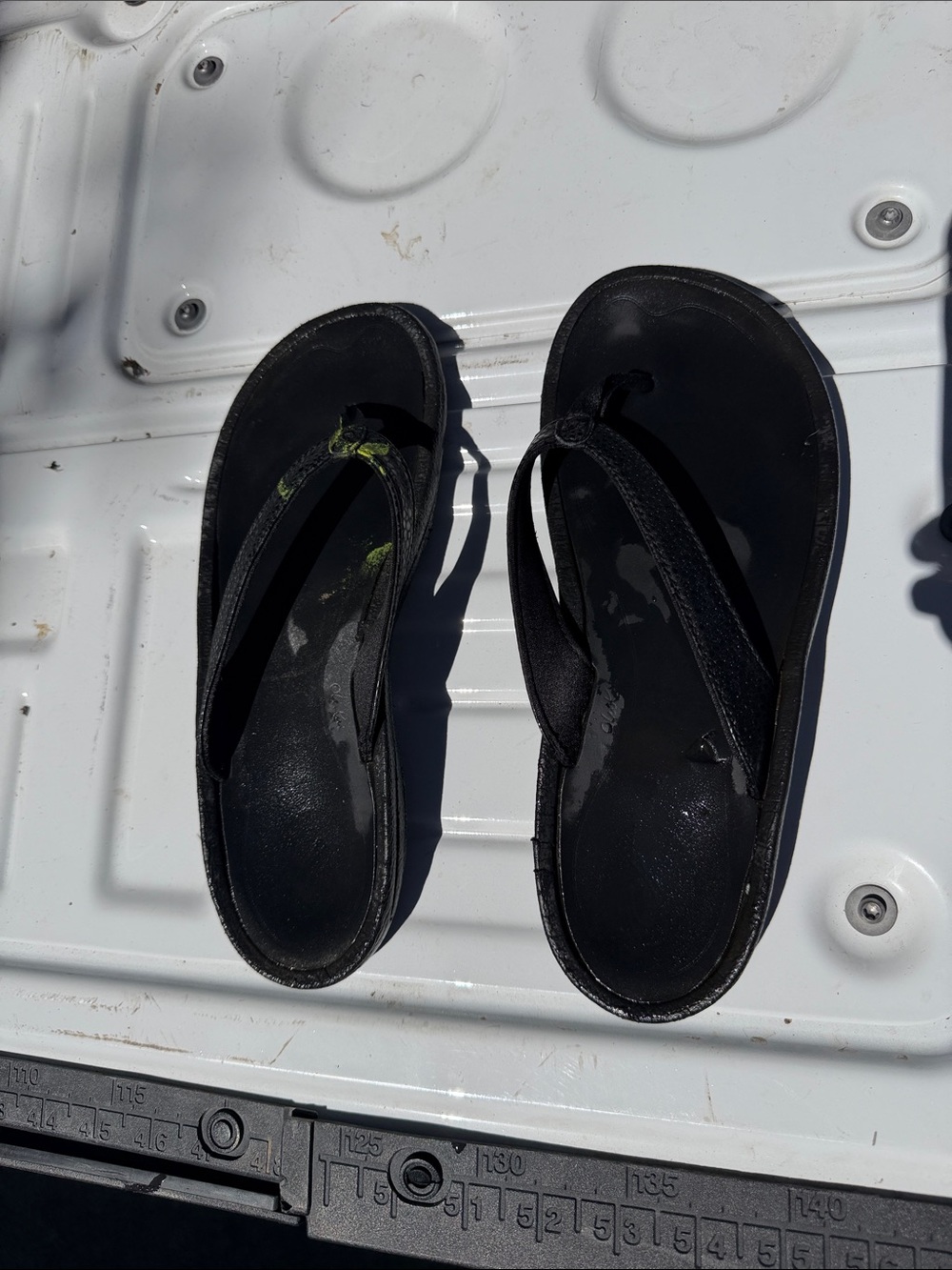 OluKai Black Flip Flop Sandals